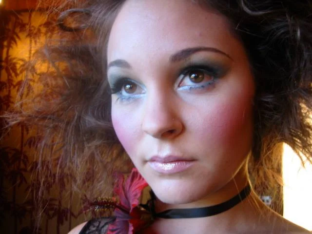 Makeup and softly styled hair