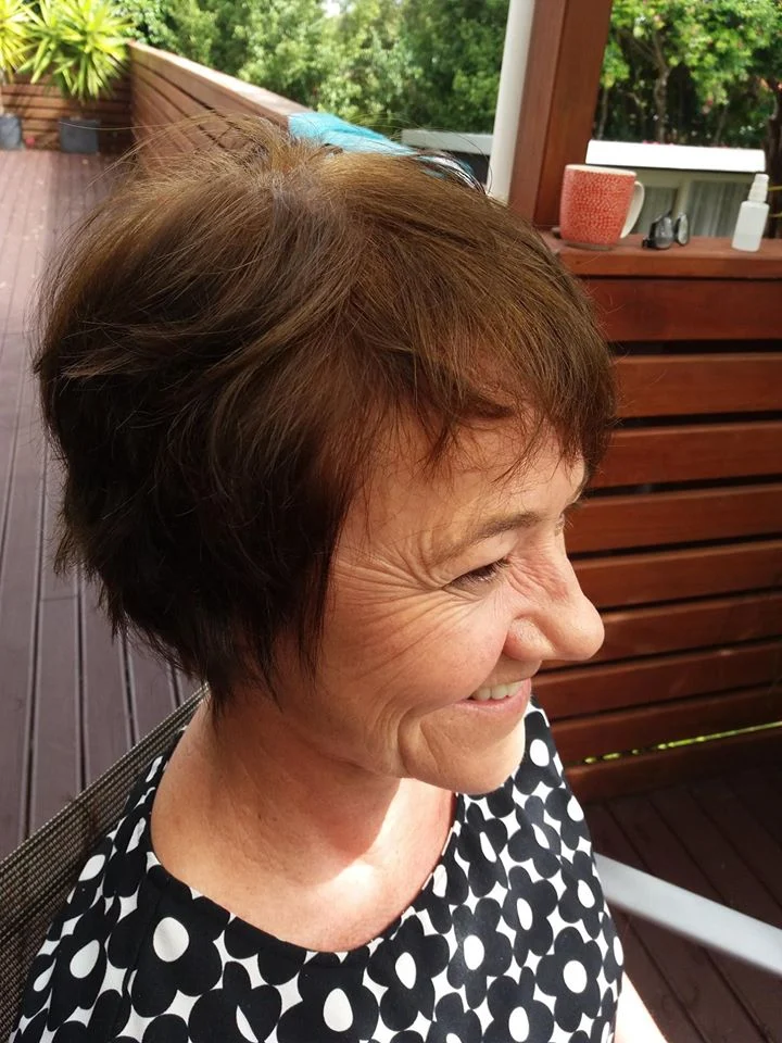 Short layered haircut in profile