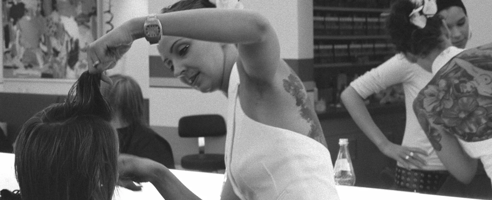 Margita cutting a client’s hair